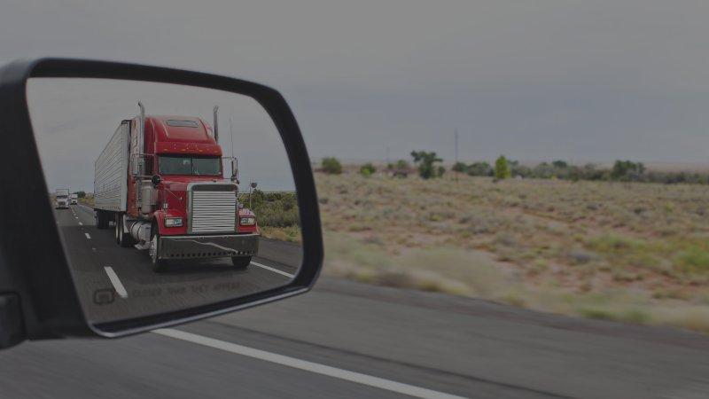 truck in rear view mirror